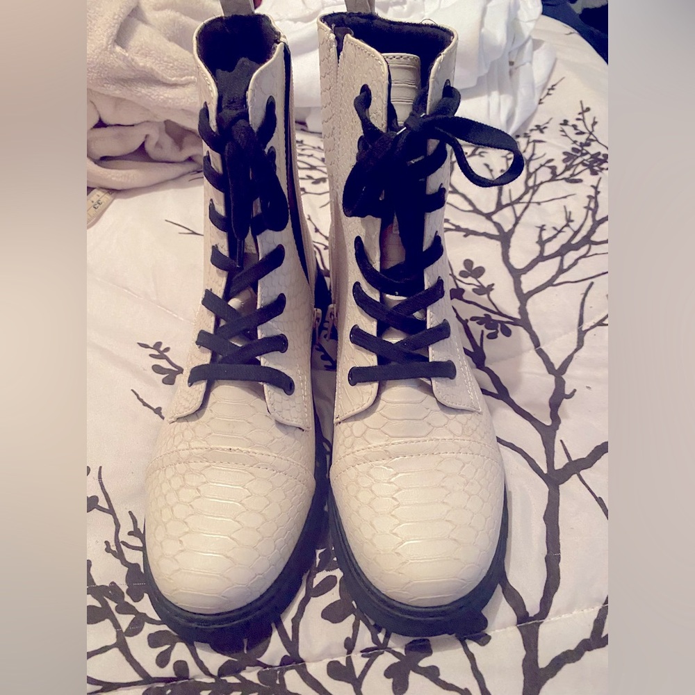 Off white faux snakeskin boots.  Only worn once.
